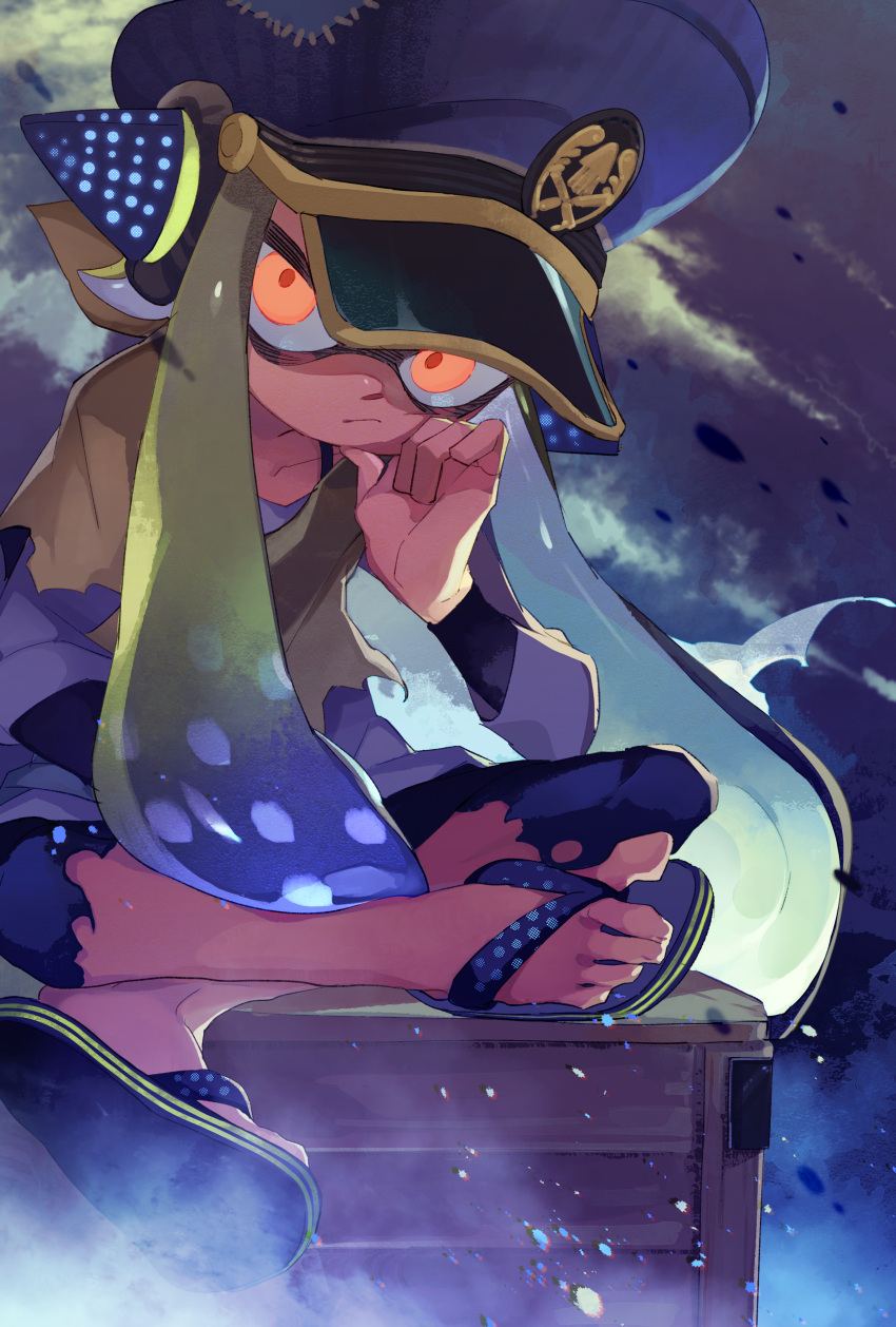 absurdres agent_3_(splatoon) female flip-flops frown green_hair hand_on_own_chin hat headphones highres indian_style inkling inkling_girl inkling_player_character looking_at_viewer mkakimikan multicolored_hair pants peaked_cap poncho sandals sitting solo splatoon_(series) splatoon_3 tentacle_hair toes torn_clothes torn_pants two-tone_hair