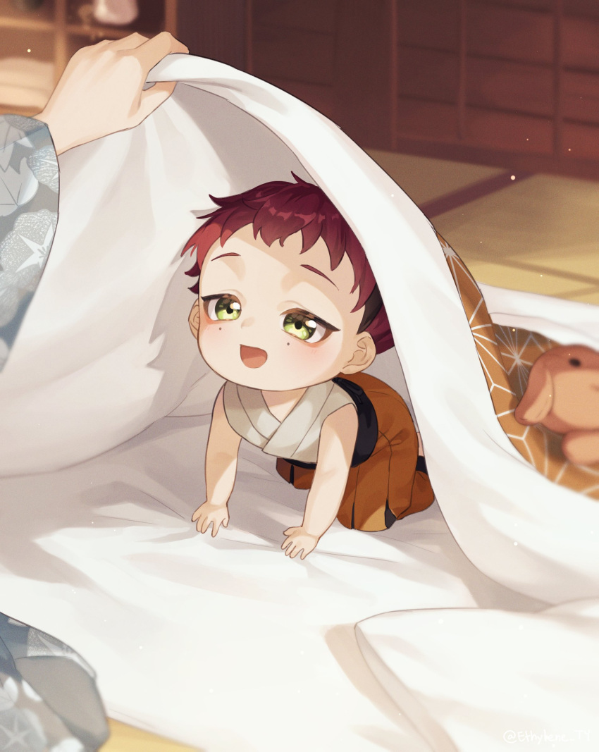 1boy aged_down dark_red_hair ethylene_ty genshin_impact green_eyes hakama hakama_shorts highres japanese_clothes looking_at_viewer male_focus mole mole_under_eye multiple_moles orange_shorts red_hair shikanoin_heizou short_hair shorts smile stuffed_animal stuffed_dog stuffed_toy