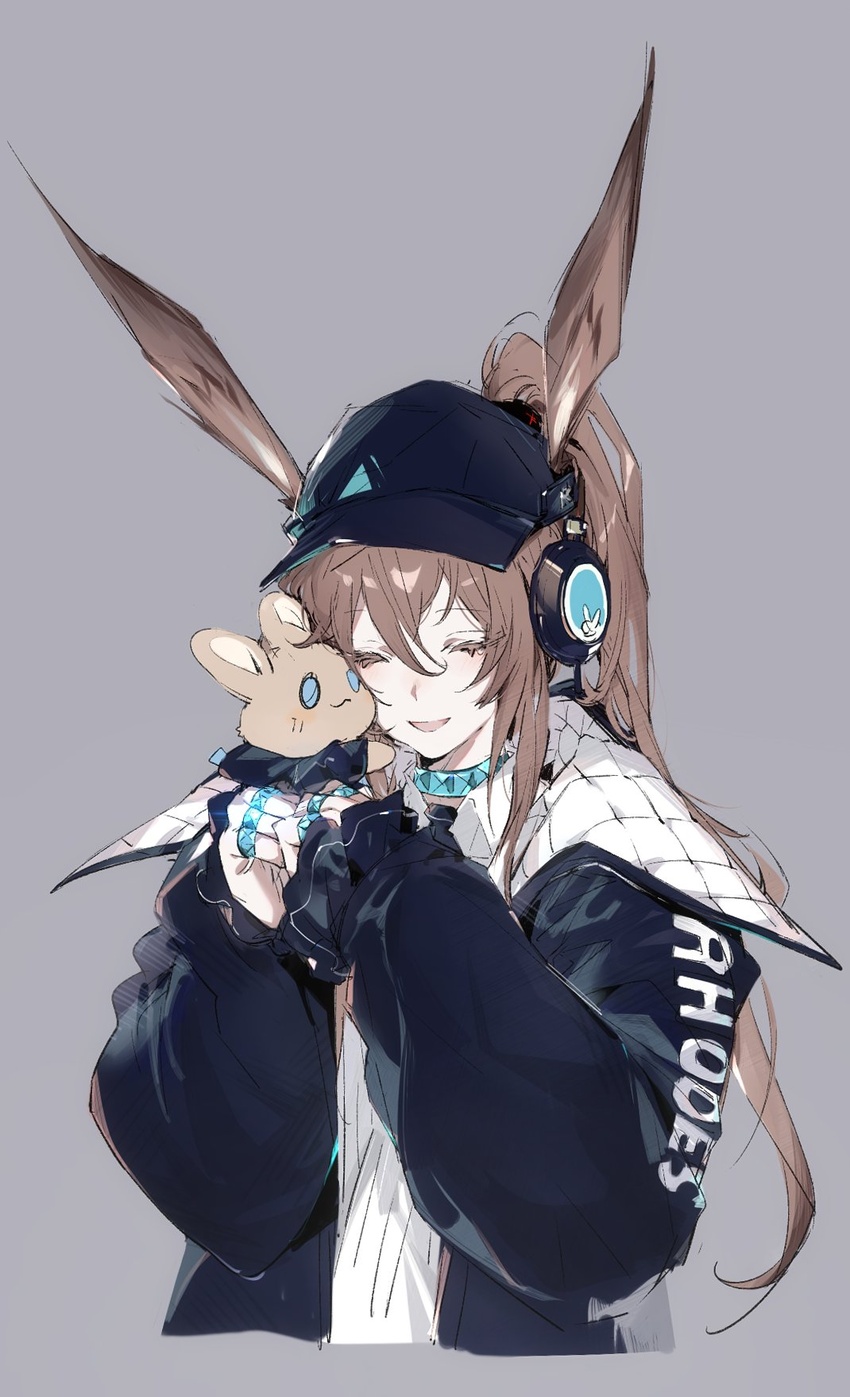 amiya_(arknights) amiya_(newsgirl)_(arknights) animal_ears arknights black_hat black_jacket brown_hair choshanland_plushy_(arknights) chuzenji closed_eyes clothes_writing commentary cropped_torso female grey_background hair_between_eyes hat headphones highres holding holding_stuffed_toy hood hood_down hooded_jacket jacket jewelry long_hair long_sleeves multiple_rings neck_ring official_alternate_costume open_clothes open_jacket open_mouth ponytail rabbit_ears ring sidelocks simple_background solo stuffed_animal stuffed_toy symbol-only_commentary thumb_ring upper_body