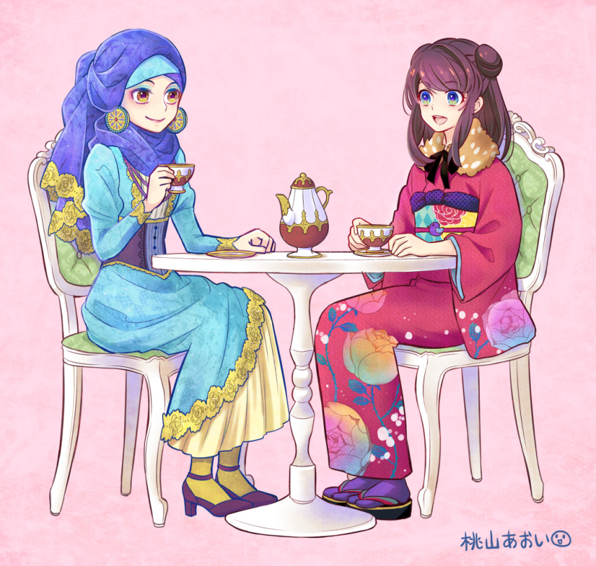 2girls artist_name blue_dress blue_eyes blue_headwear brown_eyes brown_hair chair commentary_request cup double_bun dress earrings floral_print full_body hair_bun high_heels hijab holding holding_cup japanese_clothes jewelry kimono long_sleeves momoyama_aoi multiple_girls muslim on_chair original pink_background print_kimono simple_background sitting smile table tea two_side_up