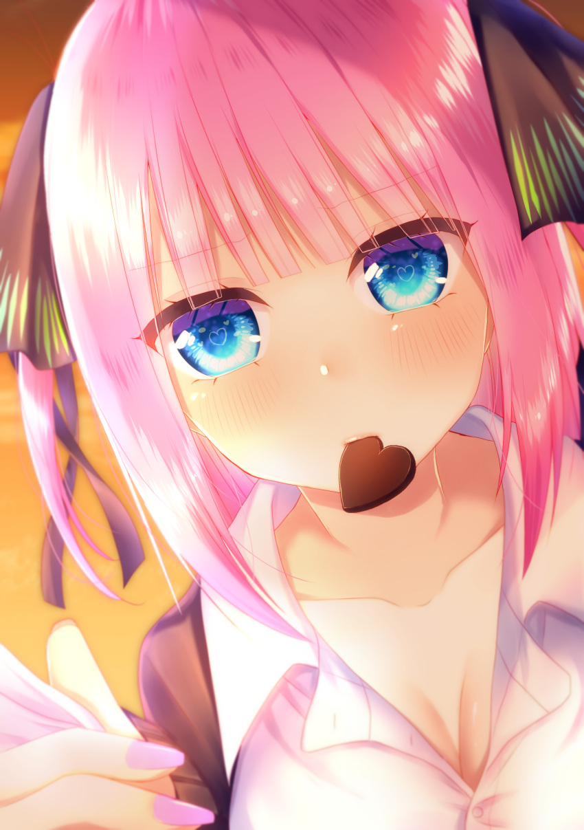 absurdres black_cardigan black_ribbon blue_eyes blunt_bangs blush breasts butterfly_hair_ornament candy cardigan chocolate cleavage collarbone eyes_visible_through_hair female food food_in_mouth go-toubun_no_hanayome hair_ornament heart heart-shaped_chocolate heart-shaped_pupils highres large_breasts looking_at_viewer mouth_hold nail_polish nakano_nino partially_unbuttoned pink_hair pink_nails ribbon shirt short_hair symbol-shaped_pupils two_side_up uniform valentine white_shirt xx_momomo_xx