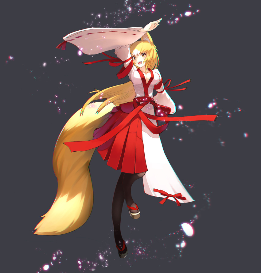 :d black_pantyhose blonde_hair breasts chromatic_aberration cleavage commentary_request female fox_tail full_body fuurai_no_shiren hakama hakama_skirt highres japanese_clothes kinketsu koharu_(fuurai_no_shiren) large_breasts long_hair long_sleeves nontraditional_miko open_clothes open_mouth pantyhose petals red_hakama red_skirt sandals skirt smile solo tail very_long_hair yellow_eyes