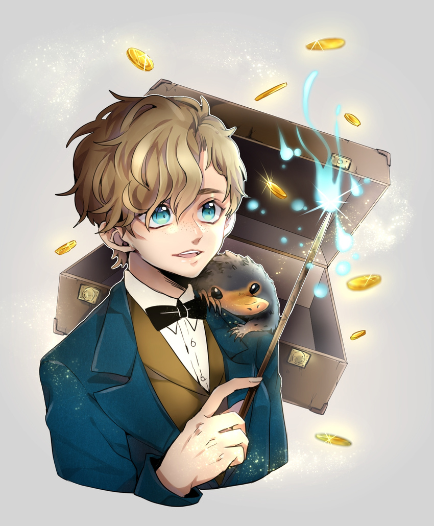 1boy blue_eyes bow bowtie brown_hair coin commentary_request fantastic_beasts_and_where_to_find_them freckles grey_background highres magic male_focus newt_scamander niffler open_mouth seitarou short_hair simple_background solo sparkle suitcase teeth upper_body wand wizarding_world