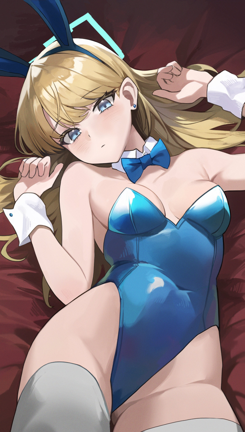 absurdres animal_ears blonde_hair blue_archive blue_bow blue_bowtie blue_eyes blue_halo blue_leotard blush bow bowtie breasts closed_mouth commentary covered_navel detached_collar earrings expressionless fake_animal_ears female halo highleg highleg_leotard highres jewelry leotard long_hair looking_at_viewer lying medium_breasts official_alternate_costume on_back ori_(0rizuru) playboy_bunny rabbit_ears solo strapless strapless_leotard thighhighs toki_(blue_archive) toki_(bunny)_(blue_archive) white_thighhighs wrist_cuffs