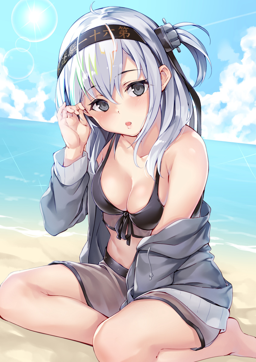 absurdres bare_shoulders beach bikini black_bikini black_headband blue_sky blush breasts cleavage clothes_writing cloud collarbone commentary_request day ebifurya fantia_reward female grey_eyes grey_hair grey_jacket hachimaki hair_between_eyes headband highres jacket kantai_collection lens_flare long_hair looking_at_viewer medium_breasts navel ocean one_side_up open_clothes open_jacket open_mouth outdoors paid_reward sand sarong see-through sky solo suzutsuki_(kancolle) suzutsuki_(swimsuit_mode)_(kancolle) swimsuit water