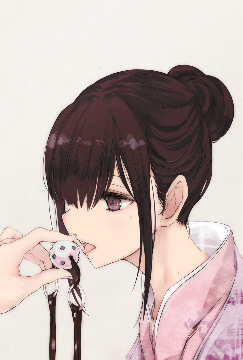 applying_gag ball_gag bondage brown_hair commentary female gag grey_eyes hair_bun highres holding holding_gag japanese_clothes kimono mole mole_under_eye nape open_mouth original portrait single_hair_bun solo tongue tongue_out touma_kisa ungagged wiffle_gag