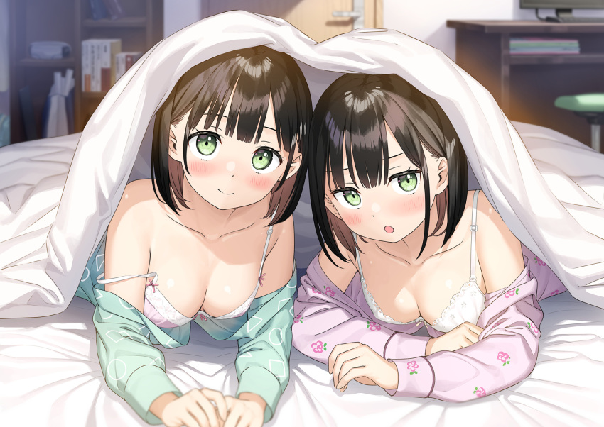 2girls akemi_(kantoku) bare_shoulders bed bed_sheet black_hair blurry blurry_background blush bra breasts cleavage closed_mouth collarbone commentary_request green_eyes highres himeru_(kantoku) indoors kantoku long_sleeves looking_at_viewer lying medium_breasts multiple_girls off_shoulder on_stomach open_mouth original pajamas short_hair siblings smile strap_slip twins under_covers underwear