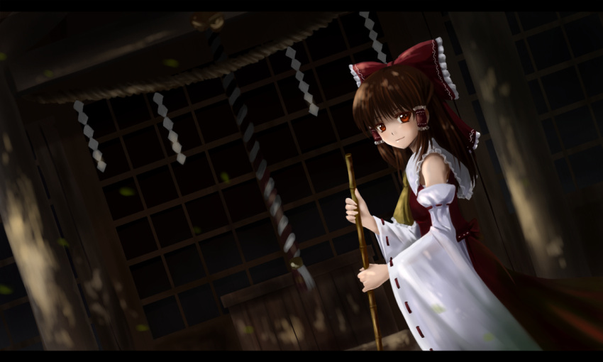 ascot bow brown_eyes brown_hair chien_zero commentary_request detached_sleeves female hair_tubes hairbow hakurei_reimu letterboxed light_smile long_hair long_sleeves looking_at_viewer red_bow shadow shirt shrine shrine_bell skirt skirt_set smile solo touhou wide_sleeves