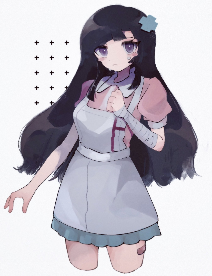 apron bandaged_hand bandages black_hair blue_eyes blush_stickers breasts clenched_hand cowboy_shot cropped_legs cross_hair_ornament danganronpa_(series) danganronpa_2:_goodbye_despair female green_skirt grey_apron hair_ornament highres kara_aren long_hair looking_at_viewer medium_breasts mole mole_under_eye pink_shirt puffy_short_sleeves puffy_sleeves shirt short_sleeves skirt solo tears tsumiki_mikan