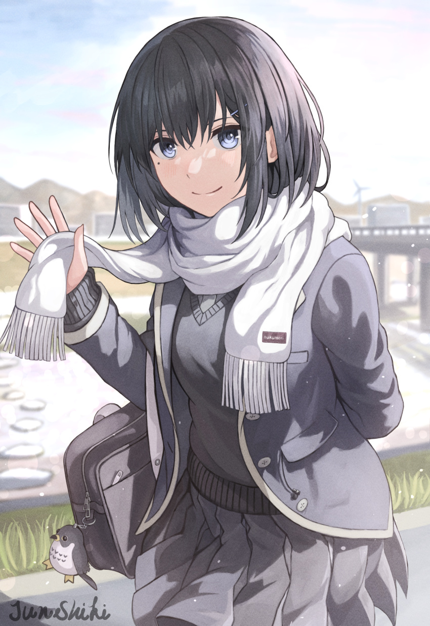 artist_name bag black_cardigan black_hair black_jacket black_skirt blue_eyes blurry blurry_background cardigan cowboy_shot female hair_ornament hairclip hand_up highres jacket junshiki looking_at_viewer mascot mole mole_under_eye open_clothes open_jacket original outdoors scarf school_bag school_uniform short_hair skirt smile solo white_scarf