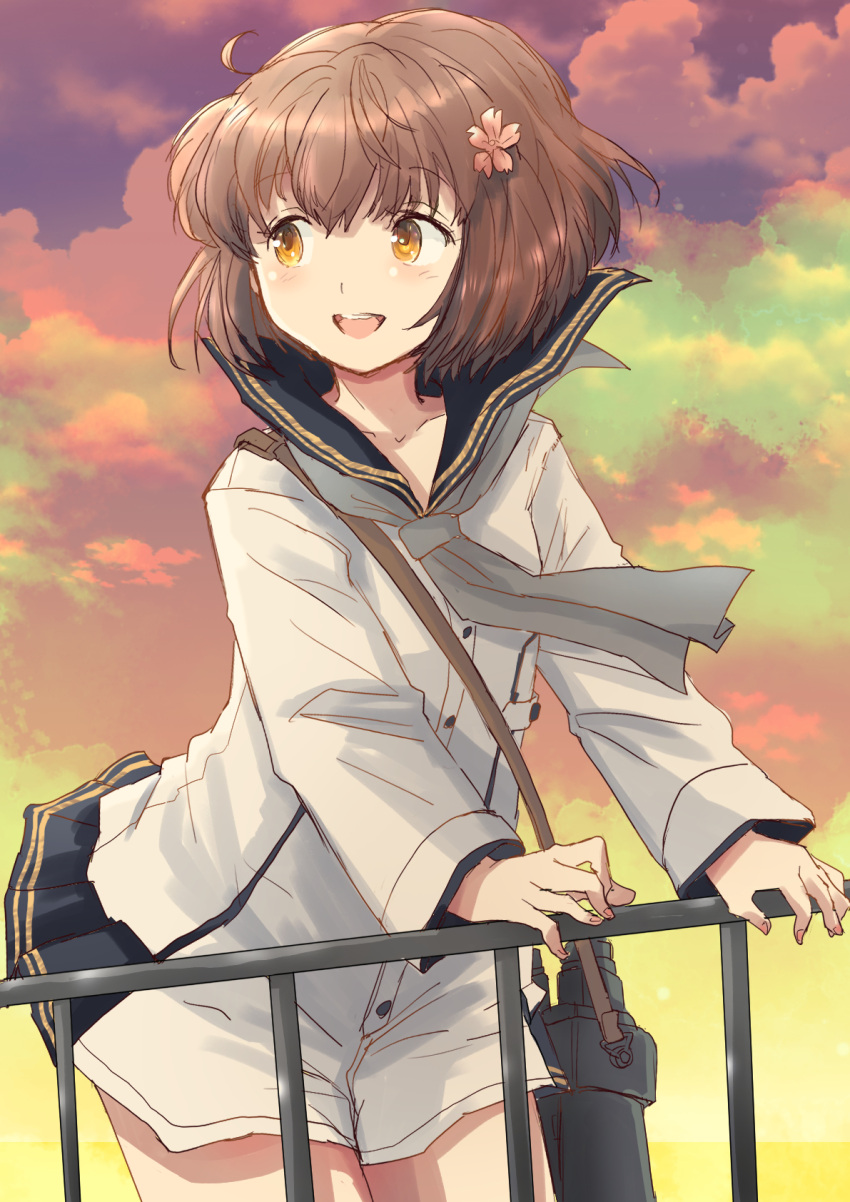 anchor_symbol bag black_sailor_collar brown_eyes brown_hair cherry_blossoms commentary cowboy_shot dress female flower fuji_(pixiv24804665) gradient_sky grey_neckerchief hair_flower hair_ornament highres kantai_collection looking_back neckerchief no_headgear orange_sky outdoors railing sailor_collar sailor_dress short_hair sky solo standing yukikaze_(kancolle) yukikaze_kai_ni_(kancolle)