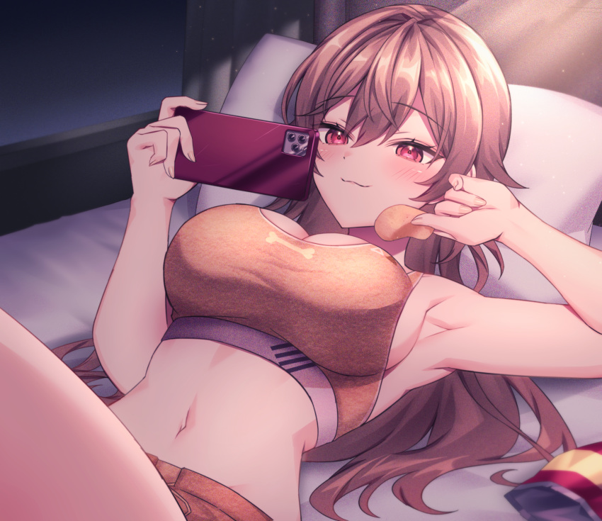 :3 armpits blush breasts brown_hair brown_shorts brown_sports_bra chips_(food) closed_mouth commentary_request female food furen_e_lustario furen_e_lustario_(5th_costume) hair_between_eyes head_on_pillow highres holding holding_food holding_phone indoors knee_up large_breasts long_hair looking_at_phone lying navel neit_ni_sei nijisanji official_alternate_costume on_back phone potato_chips red_eyes shorts smile solo sports_bra stomach virtual_youtuber