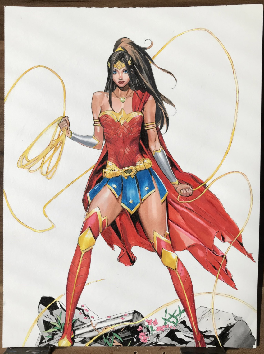 armlet artofcelor blue_eyes blue_skirt boots bracer breasts brown_eyes brown_hair cape circlet dc_comics female high_ponytail highres holding_lasso jewelry lasso lasso_of_truth leotard long_hair looking_at_viewer miniskirt necklace photo_(medium) red_cape red_footwear red_leotard ruins signature skirt small_breasts solo standing strapless strapless_leotard thigh_boots white_background wonder_woman wonder_woman_(series)