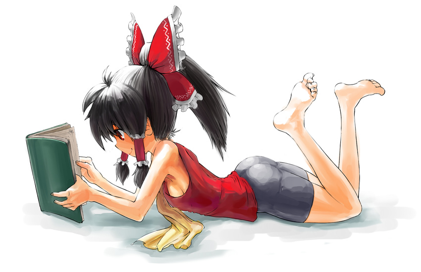 armpits ass barefoot bike_shorts black_hair book bow breasts casual commentary_request feet female hairbow hakurei_reimu highres lying medium_breasts on_stomach ponytail reading red_bow red_eyes sideboob smile solo spider-ma the_pose touhou