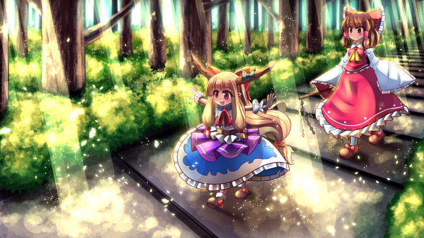 2girls ascot belt blonde_hair bow brown_eyes brown_hair commentary dappled_sunlight detached_sleeves forest gohei hairbow hakurei_reimu horn_ornament horn_ribbon horns ibuki_suika layered_skirt light_rays long_hair low-tied_long_hair meowpoo multiple_girls nature open_mouth outdoors outstretched_arms path red_eyes ribbon road shirt sidelocks skirt skirt_set sleeveless sleeveless_shirt smile spread_arms sunbeam sunlight touhou very_long_hair walking wrist_cuffs