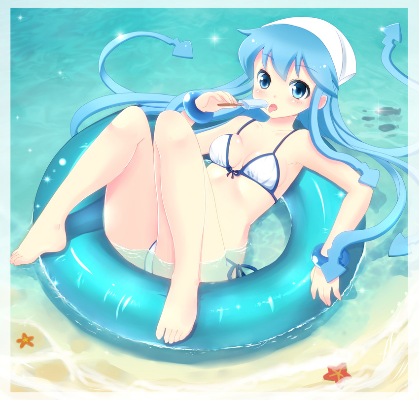 barefoot beach bikini blue_eyes blue_hair bracelet commentary_request female fish food hat highres ikamusume innertube jewelry licking long_hair mofumofu_(minidora-dorara) popsicle sand shinryaku!_ikamusume side-tie_bikini_bottom solo squid_hat starfish swim_ring swimsuit tentacle_hair white_bikini