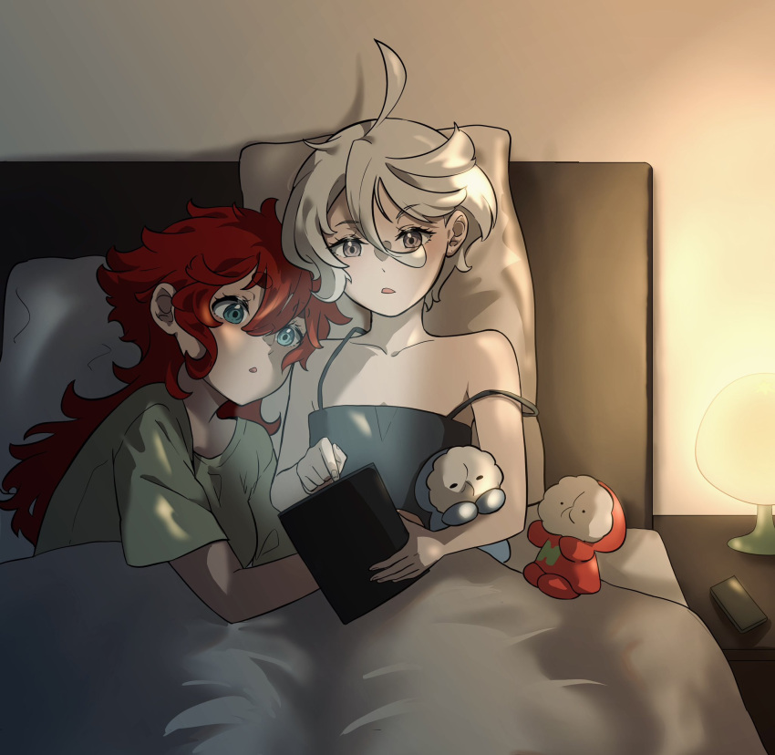 2girls bedroom black_camisole blue_eyes camisole collarbone commentary_request cool_(gundam_suisei_no_majo) cuddling green_shirt gundam gundam_suisei_no_majo highres holding holding_tablet_pc hots_(gundam_suisei_no_majo) indoors korean_commentary lamp long_hair miorine_rembran mo_suma multiple_girls on_bed parted_lips red_hair shirt short_hair short_sleeves strap_slip suletta_mercury tablet_pc thick_eyebrows under_covers white_hair yuri