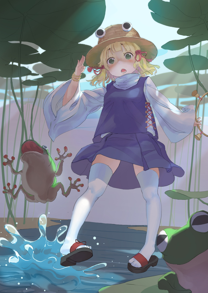 absurdres arm_up bell blonde_hair blue_skirt blue_vest cross-laced_clothes cross-laced_vest female floating frog googly_eyes green_eyes hair_ornament hair_ribbon hat high_collar highres holding_hoop hoop light_blush lily_pad moriya_suwako oerba_yun_fang open_mouth pond ribbon sandals shirt skirt splashing tabi tassel tassel_hair_ornament telekinesis thighhighs touhou two_side_up vest water wedee white_shirt white_thighhighs wide_sleeves