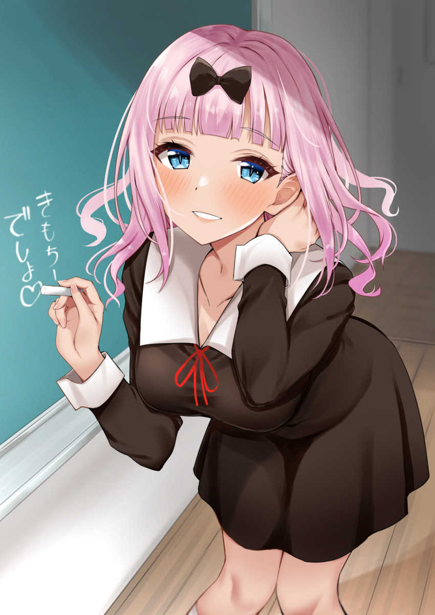 absurdres black_bow black_dress blue_eyes blunt_bangs blush bow breasts chalk chalkboard collarbone commentary dress feet_out_of_frame female fujiwara_chika hairbow heart highres holding kaguya-sama_wa_kokurasetai_~tensai-tachi_no_renai_zunousen~ kitaku_(nakamachi_machi) large_breasts leaning_forward long_hair long_sleeves looking_at_viewer parted_lips pink_hair red_ribbon ribbon school_uniform shuuchiin_academy_school_uniform smile solo standing translated