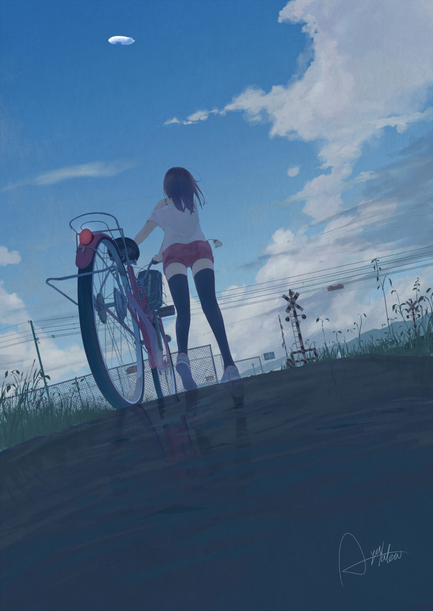 aircraft ayataka bicycle black_thighhighs blue_sky cloud cloudy_sky day dirigible facing_away female from_behind grass highres medium_hair original outdoors power_lines railroad_signal red_shorts reflection scenery shirt shoes shorts signature sky solo standing thighhighs white_shirt