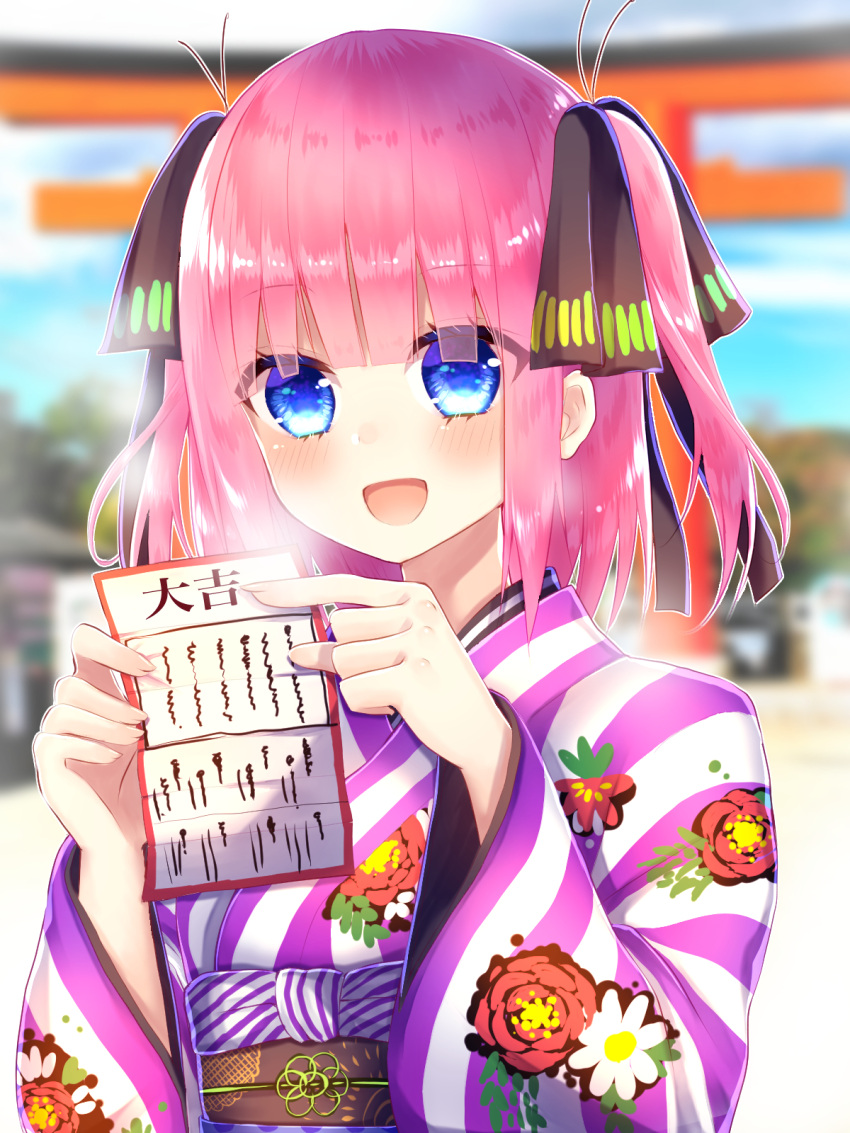 :d black_ribbon blue_eyes blunt_bangs blush butterfly_hair_ornament day female go-toubun_no_hanayome hair_ornament highres japanese_clothes kimono looking_at_viewer nakano_nino new_year obi omikuji outdoors pink_hair purple_kimono ribbon sash short_hair smile striped_clothes striped_kimono torii two_side_up xx_momomo_xx