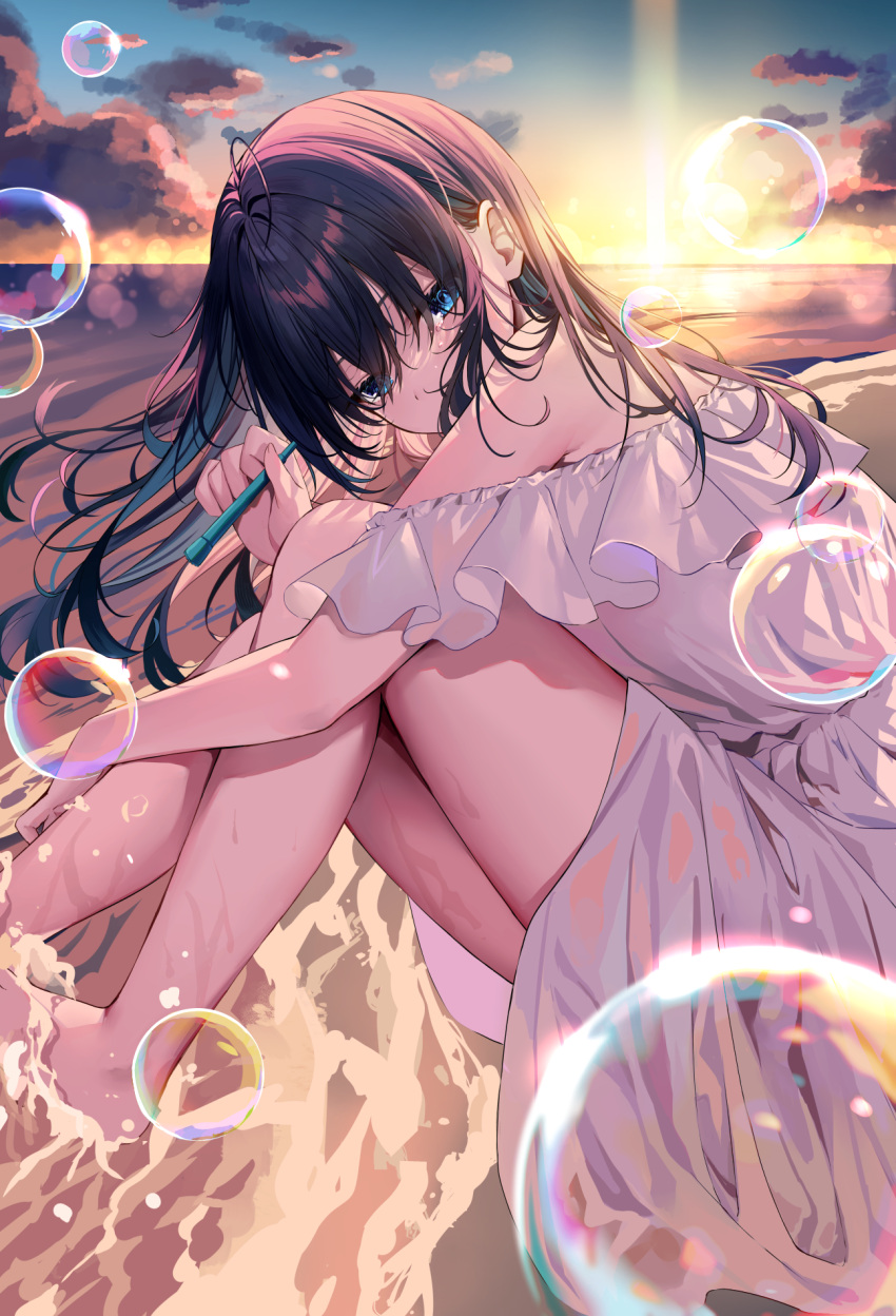 bare_shoulders black_hair blue_eyes bubble bubble_wand cloud commentary dress english_commentary female from_side highres hizuki_higure knees_up long_hair looking_at_viewer looking_to_the_side ocean off_shoulder original outdoors sitting solo sunlight sunset thighs water wet white_dress