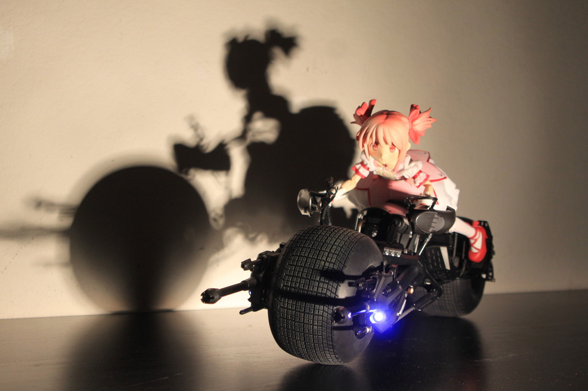 batman_(series) batpod bow crossover dc_comics dress female figure hairbow kaname_madoka kaname_madoka_(magical_girl) mahou_shoujo_madoka_magica mahou_shoujo_madoka_magica_(anime) moonshine_animations motor_vehicle motorcycle photo_(medium) pink_eyes pink_hair riding self-upload shadow shoes silhouette solo toy twintails white_legwear