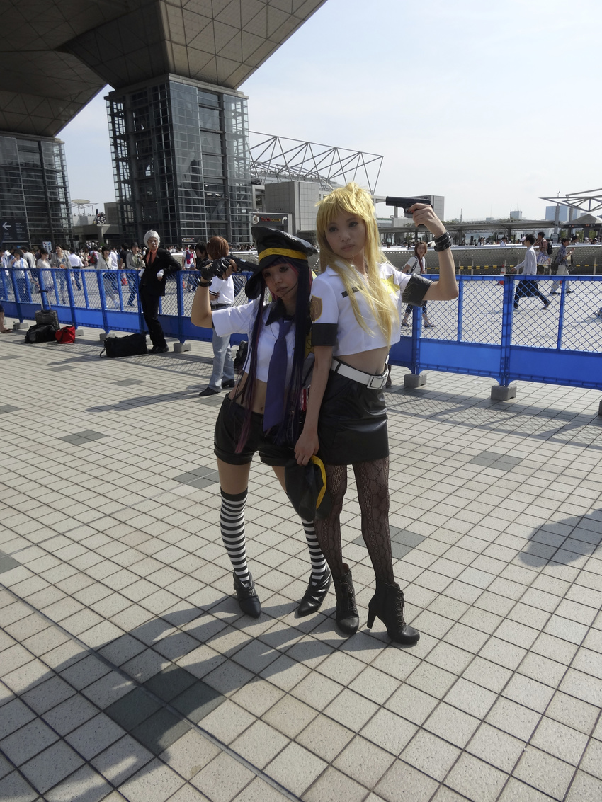 absurdres ankle_boots belt black_legwear boots comiket82 cosplay cross-laced_footwear gloves gun hat high_heel_boots high_heels highres legwear navel necktie panty_&_stocking_with_garterbelt panty_(cosplay) patterned_legwear photo skirt socks stocking_(cosplay) thighs weapon white_belt