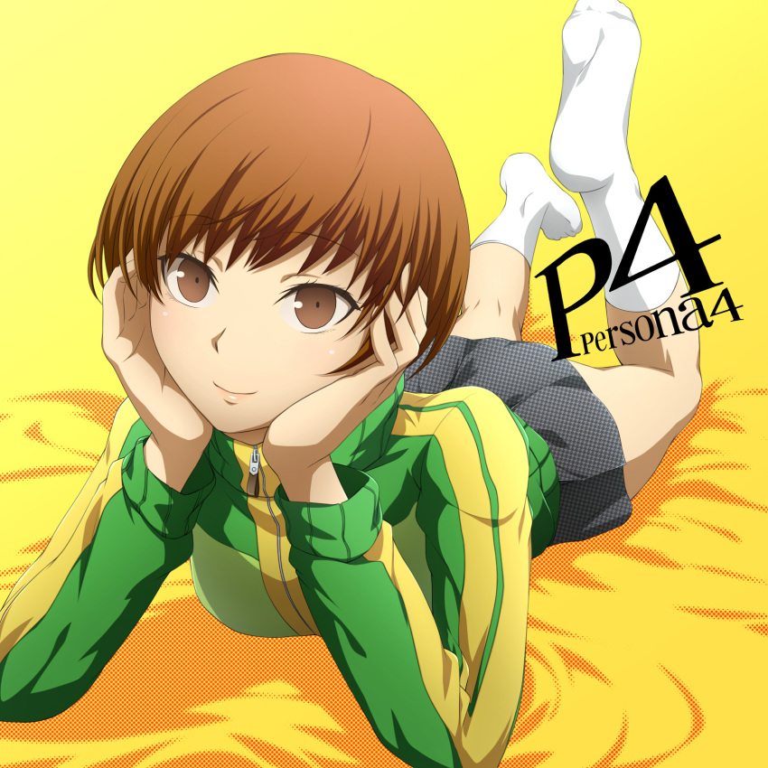 brown_eyes brown_hair commentary_request female highres jacket kokutou looking_at_viewer lying on_stomach persona persona_4 satonaka_chie school_uniform short_hair skirt smile socks solo the_pose track_jacket white_socks