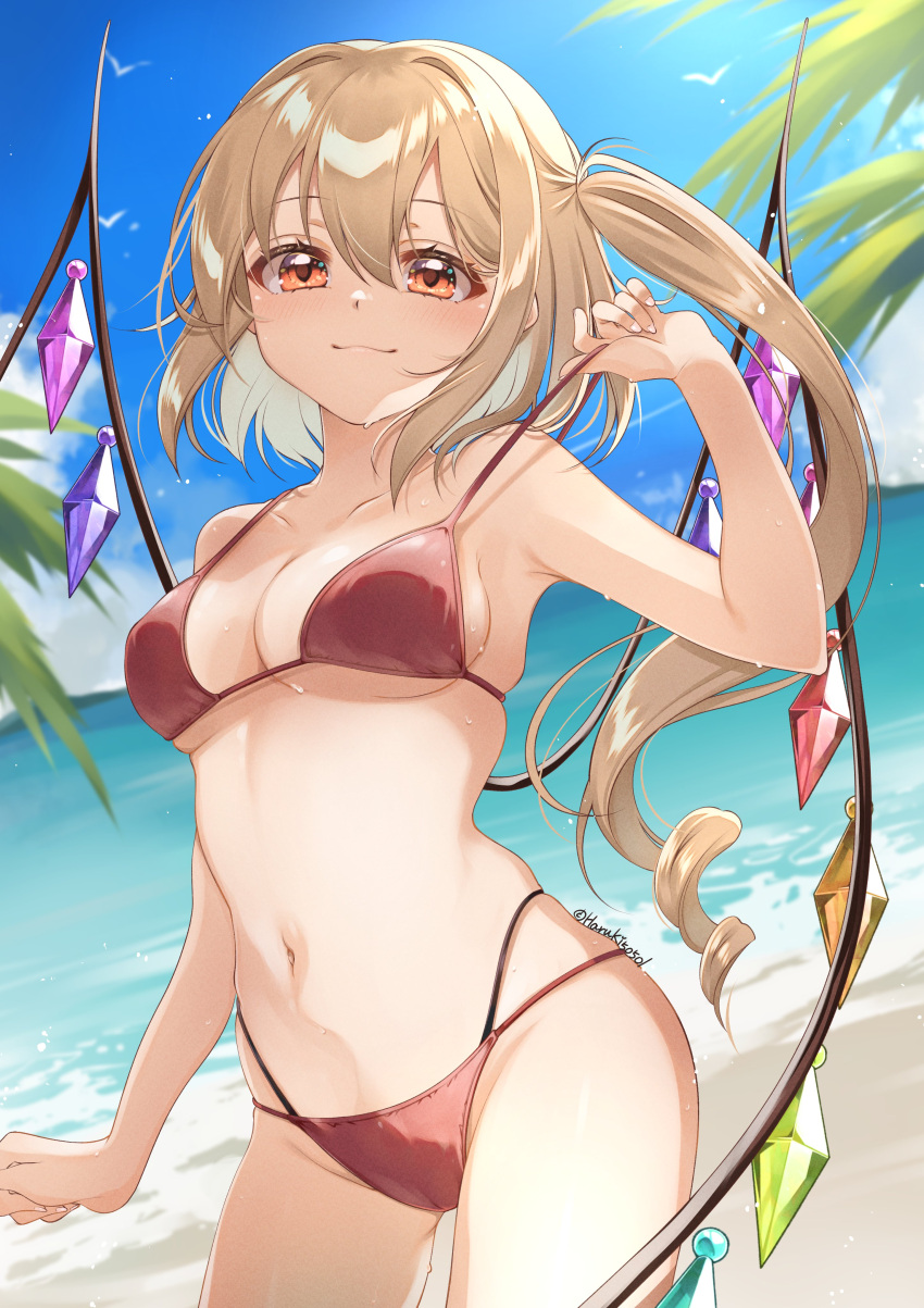 absurdres beach bikini blonde_hair breasts closed_mouth collarbone commentary_request cowboy_shot crystal day female flandre_scarlet hand_up haruki_(colorful_macaron) highres light_blush long_hair looking_at_viewer making-of_available medium_breasts multi-strapped_bikini_bottom navel ocean one_side_up orange_eyes outdoors red_bikini sky solo strap_pull swimsuit touhou twitter_username wings