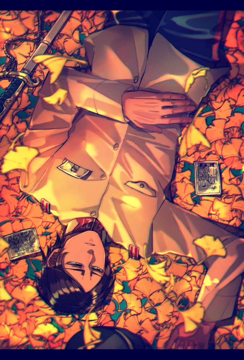 1boy araiguma_(gomipanda123) arm_up autumn autumn_leaves black_hair black_pants brown_jacket buttons chromatic_aberration collar collared_jacket commentary_request dark-skinned_male dark_skin eyebrows from_above golden_kamuy hat highres imperial_japanese_army jacket koito_otonoshin leaf long_sleeves looking_away lying male_focus military military_hat military_uniform on_back pants parted_bangs photo_(object) pocket solo sword tsurumi_tokushirou uniform unworn_headwear upper_body weapon yellow_eyes