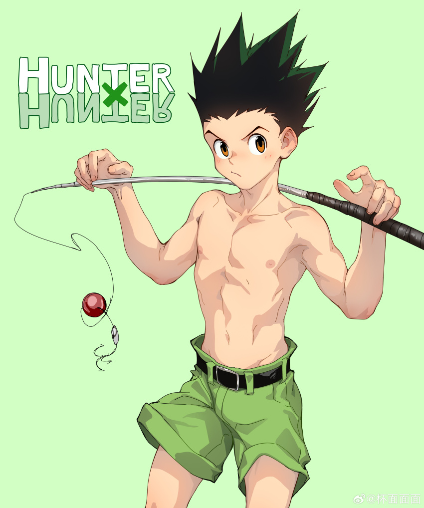 1boy absurdres beitemian belt black_belt blush brown_eyes closed_mouth copyright_name fishing_rod gon_freecss green_background green_hair green_shorts highres holding holding_fishing_rod hunter_x_hunter male_focus navel nipples short_hair shorts simple_background solo spiked_hair topless_male