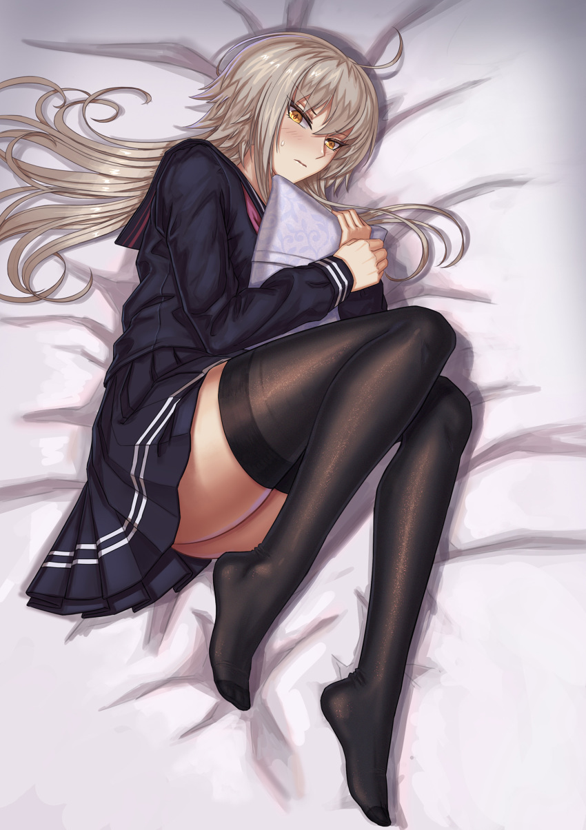 ahoge bed black_legwear commentary fate/grand_order fate_(series) feet female grey_hair hair_spread_out highres hugging_object jeanne_d'arc_alter_(avenger)_(fate) jeanne_d'arc_alter_(fate) legs long_hair looking_at_viewer nairobi_song no_shoes on_bed photoshop_(medium) pillow pillow_hug school_uniform serafuku skirt thighhighs yellow_eyes