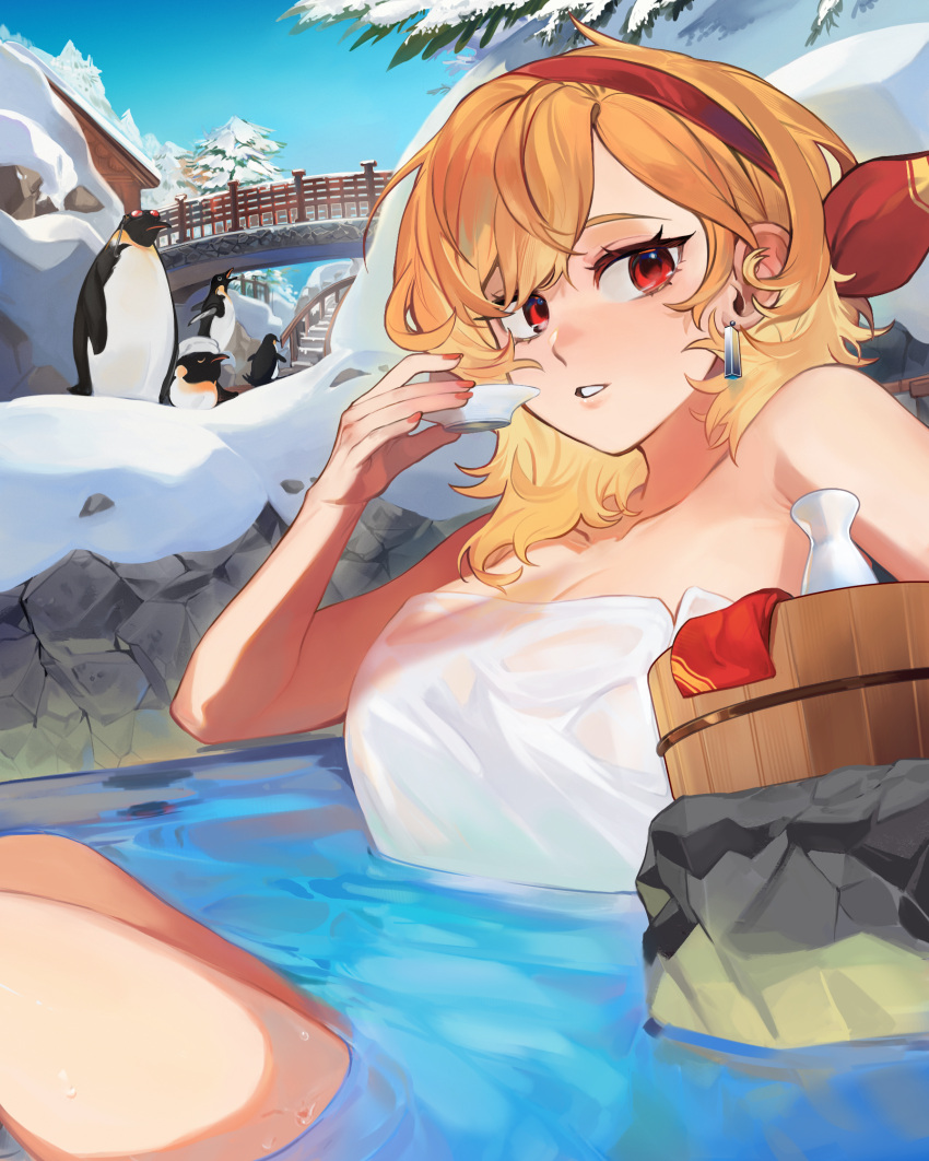 bird blonde_hair breasts bridge cleavage commentary commission day earrings english_commentary eus_ing female highres hololive hololive_indonesia jewelry kaela_kovalskia large_breasts looking_at_viewer naked_towel outdoors partially_submerged penguin red_eyes second-party_source snow snowscape solo towel tree virtual_youtuber water