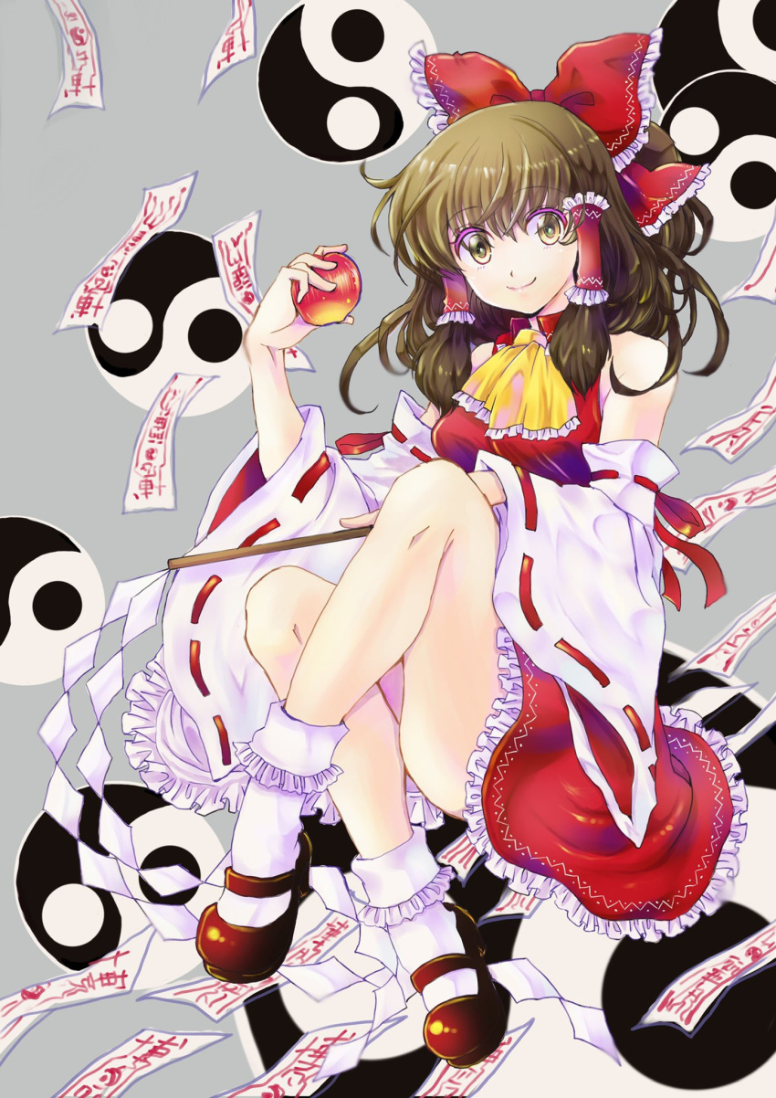 apple asai_ichiko ascot bow brown_hair commentary crossed_ankles detached_sleeves female food fruit full_body grey_background hair_tubes hairbow hakurei_reimu highres holding holding_food holding_fruit looking_at_viewer mary_janes ofuda red_bow ribbon-trimmed_sleeves ribbon_trim shoes simple_background skirt smile socks solo touhou underwear yellow_eyes yin_yang