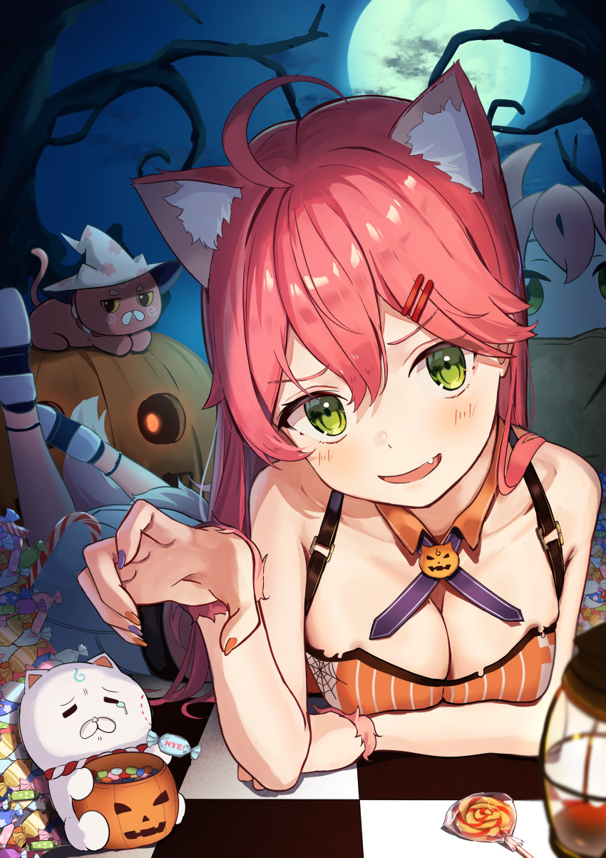 35p_(sakura_miko) absurdres ahoge alternate_costume animal_ear_fluff animal_ears bare_shoulders breasts candy cat_ears cleavage commentary_request female food full_moon green_eyes hair_ornament halloween highres hololive kintoki_(sakura_miko) large_breasts looking_at_viewer lying moon oerba_yun_fang on_stomach open_mouth pink_hair sakura_miko shiotsuke_sasami smile virtual_youtuber