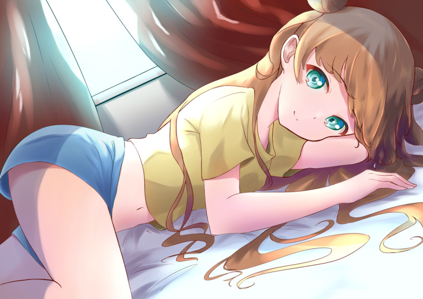 aqua_shorts blue_eyes brown_hair choppy_bangs commentary curtains double_bun female futon hair_bun hair_spread_out indoors kiratto_pri_chan long_hair looking_at_viewer lying midriff navel nijinosaki_dia on_side orange0150 pretty_series red_curtains shirt short_sleeves shorts sidelocks smile solo stomach yellow_shirt