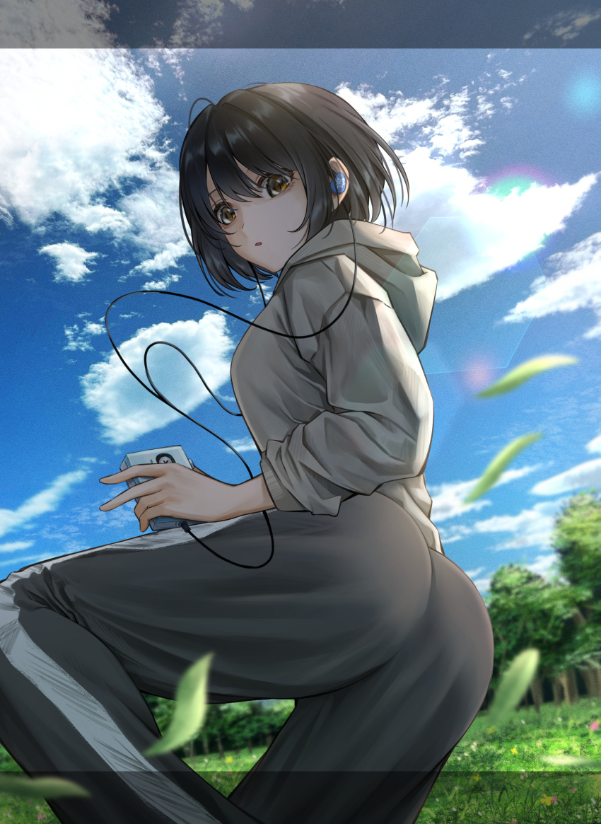 ass black_hair daiko_(dai1974910) earphones falling_leaves female grass grey_hoodie grey_pants highres hood hoodie idolmaster idolmaster_cinderella_girls leaf looking_at_viewer looking_to_the_side outdoors pants short_hair solo standing standing_on_one_leg takafuji_kako