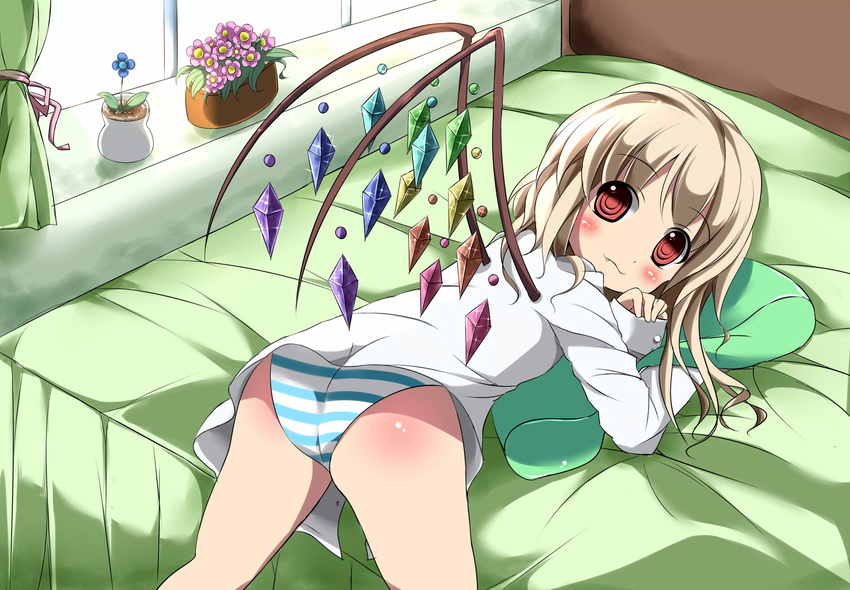 :3 ass bed blonde_hair blush commentary_request curtains dress_shirt female flandre_scarlet flower flower_pot kazura looking_at_viewer lying no_headwear oerba_yun_fang on_bed on_stomach panties pillow red_eyes shirt short_hair solo striped_clothes striped_panties touhou underwear window wings