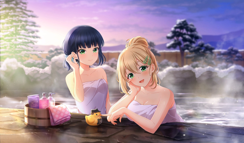 2girls :d bamboo_fence bare_shoulders bathing black_hair blonde_hair blurry bucket cinderella_series closed_mouth cobblestone collarbone depth_of_field fence game_cg green_eyes hachigatsu_no_cinderella_nine hair_bun hair_ornament hairclip hand_on_own_cheek hand_on_own_face highres light_particles long_hair looking_at_viewer multiple_girls naked_towel non-web_source nozaki_yuuki official_alternate_hairstyle official_art onsen open_mouth outdoors partially_submerged rock rubber_duck single_hair_bun sky smile snow soap_bottle steam suzuki_waka towel tree water white_towel wooden_bucket