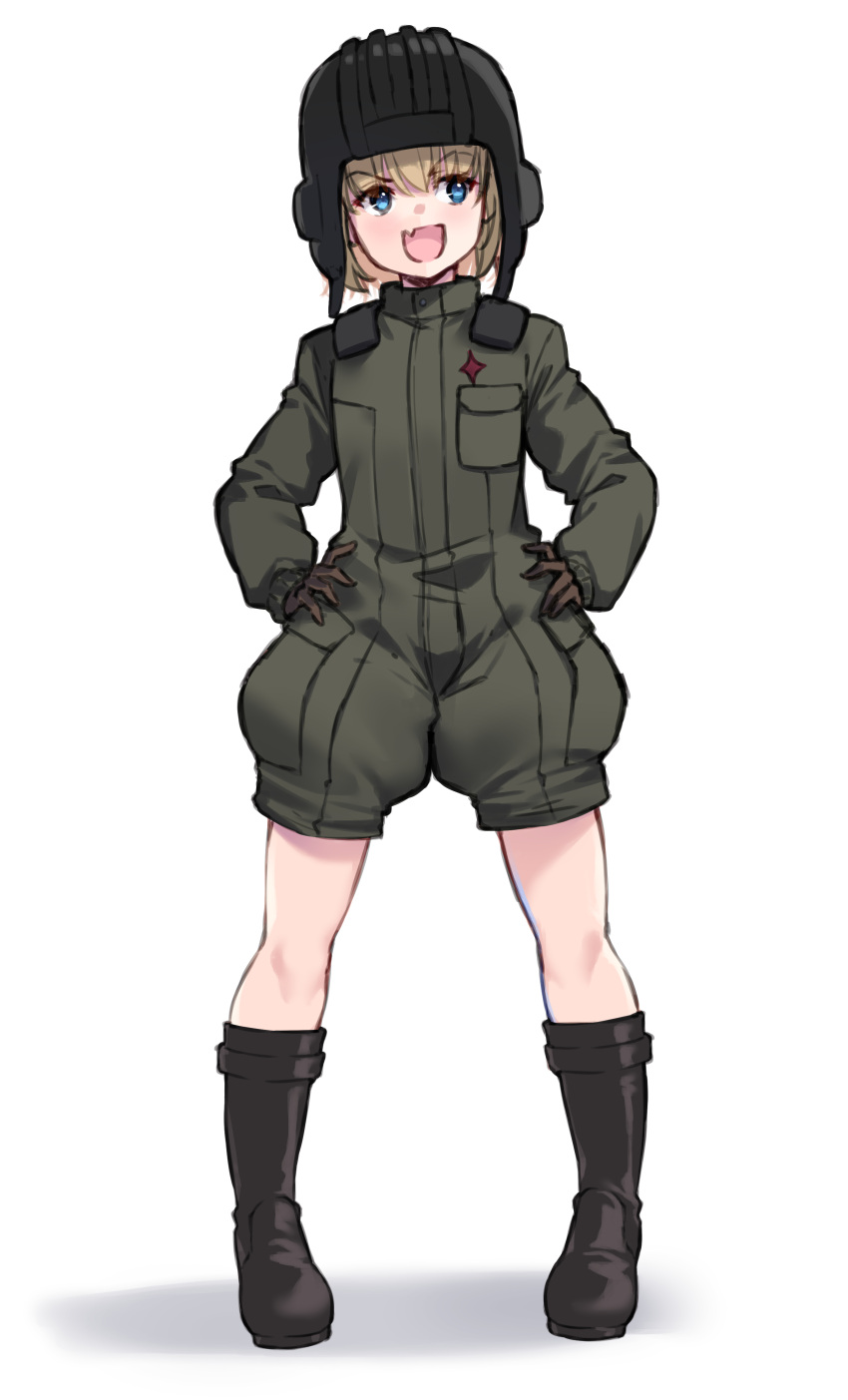 absurdres black_footwear black_gloves black_headwear blonde_hair blue_eyes boots commentary female full_body girls_und_panzer gloves green_jumpsuit helmet highres insignia jumpsuit katyusha_(girls_und_panzer) kimi_tsuru long_sleeves military military_uniform oerba_yun_fang pravda_military_uniform short_hair short_jumpsuit simple_background skin_fang smirk solo standing tank_helmet uniform white_background