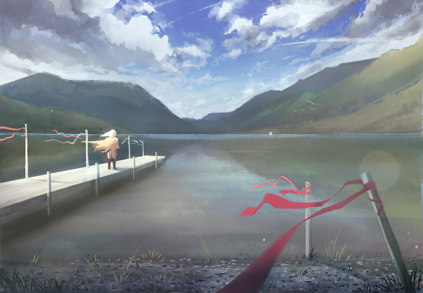 bird blue_sky boots brown_footwear cape cloud cloudy_sky commentary day facing_away female from_behind lake landscape lens_flare long_hair mountain original outdoors pier reflection scenery shore sky solo soup-plz standing water white_hair yellow_cape