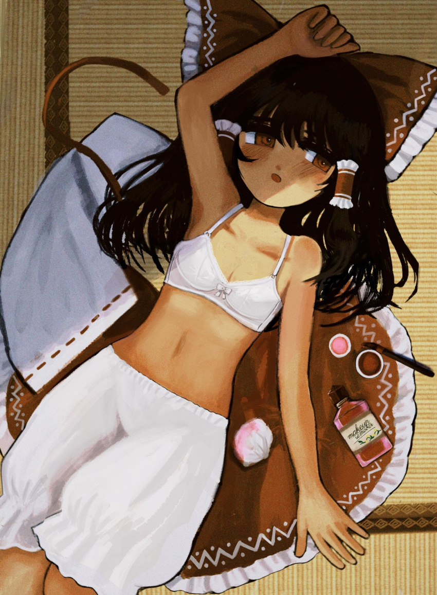 armpits black_hair bloomers blush bow bra breasts cleavage clothes_on_floor collarbone commentary cosmetics cotton_ball dark-skinned_female dark_skin female frilled_hair_tubes frills from_above hair_tubes hairbow hakurei_reimu hand_on_own_head hell0120 highres lying medium_hair navel on_back open_mouth sideways_glance small_breasts solo tatami touhou underwear unworn_clothes white_bloomers white_bra