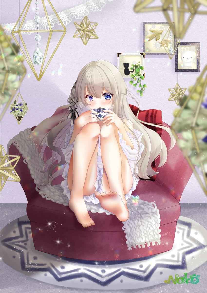 absurdres armchair artist_name azur_lane bare_legs barefoot blue_eyes blush chair closed_mouth cup female hair_ribbon heterochromia highres holding holding_cup legs long_hair looking_at_viewer murmansk_(azur_lane) murmansk_(sceneries_of_pure_snow)_(azur_lane) nako_nya nightgown official_alternate_costume pillow platinum_blonde_hair purple_eyes ribbon sitting soles solo teacup white_nightgown