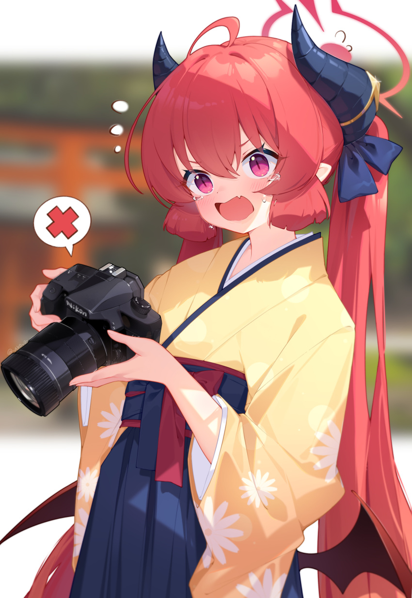 absurdres akovo black_horns blue_archive blurry blurry_background camera commentary_request female floral_print halo highres holding holding_camera horns japanese_clothes junko_(blue_archive) kimono long_hair looking_at_viewer oerba_yun_fang open_mouth pink_eyes print_kimono red_hair red_halo skin_fang tears twintails wide_sleeves yellow_kimono