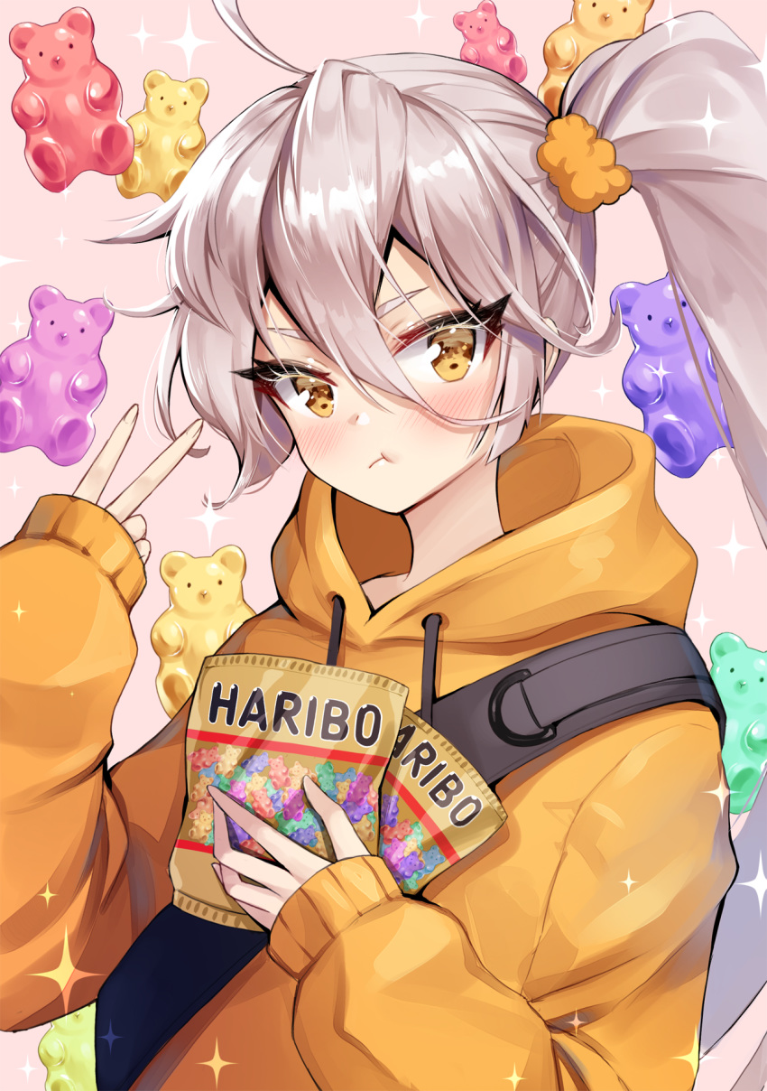 ahoge ankkoyom bad_id bad_pixiv_id blush commentary copyright_name eating female girls'_frontline grey_hair gummy_bear hair_between_eyes hair_ornament haribo highres holding hood hood_down hoodie long_hair looking_at_viewer orange_hoodie pkp_(girls'_frontline) side_ponytail sleeves_past_wrists solo very_long_hair yellow_eyes