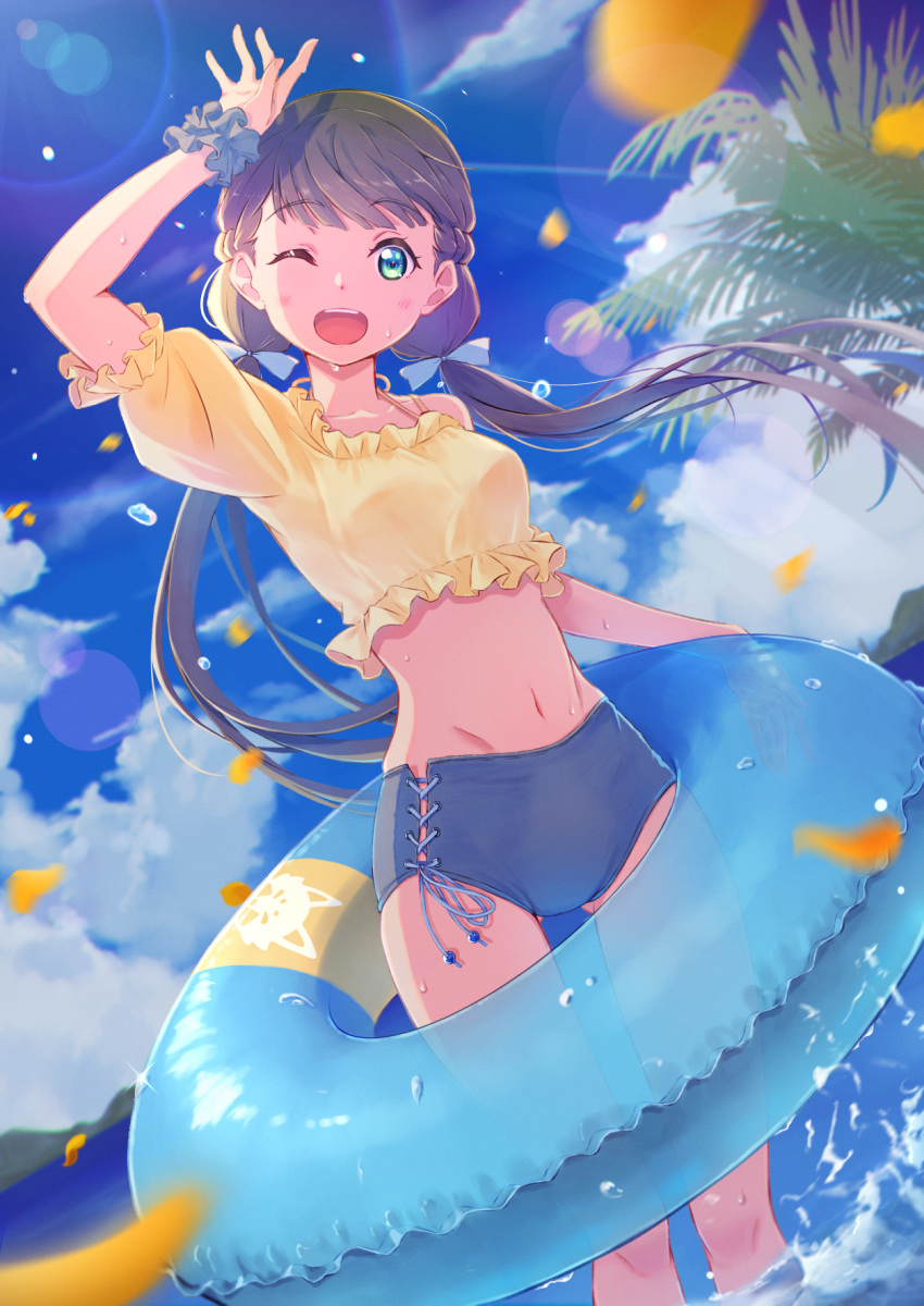 blue_sky brown_hair cloud female green_eyes highres innertube long_hair looking_at_viewer love_live! love_live!_superstar!! low_twintails macken midriff navel one_eye_closed open_mouth palm_leaf puffy_short_sleeves puffy_sleeves sakurakoji_kinako shirt short_sleeves sky smile solo standing swim_ring twintails water yellow_shirt