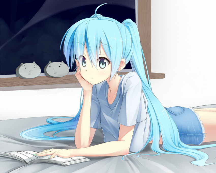 ahoge bed blue_eyes blue_hair book casual commentary_request female hatsune_miku indoors kuroneko_shiro long_hair lying nail_polish on_bed on_stomach reading shirt solo t-shirt twintails very_long_hair vocaloid