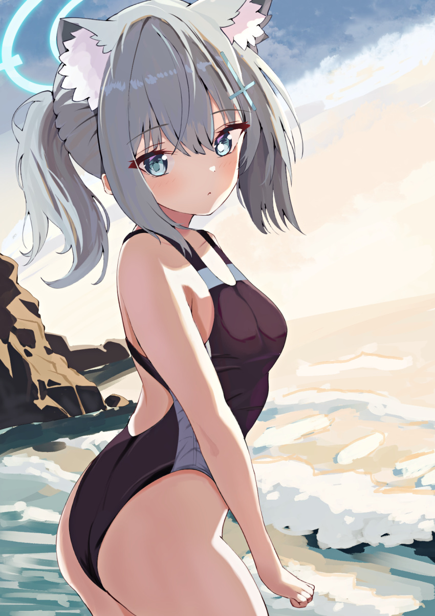 animal_ear_fluff animal_ears ass beach black_one-piece_swimsuit blue_archive blue_eyes breasts cloud commentary competition_swimsuit cross_hair_ornament extra_ears female grey_hair hair_ornament halo highres looking_at_viewer low_ponytail medium_breasts medium_hair mismatched_pupils multicolored_clothes multicolored_swimsuit natsuki_(natsu_1936) official_alternate_costume one-piece_swimsuit orange_sky rock shiroko_(blue_archive) shiroko_(swimsuit)_(blue_archive) sky solo swimsuit waves wolf_ears