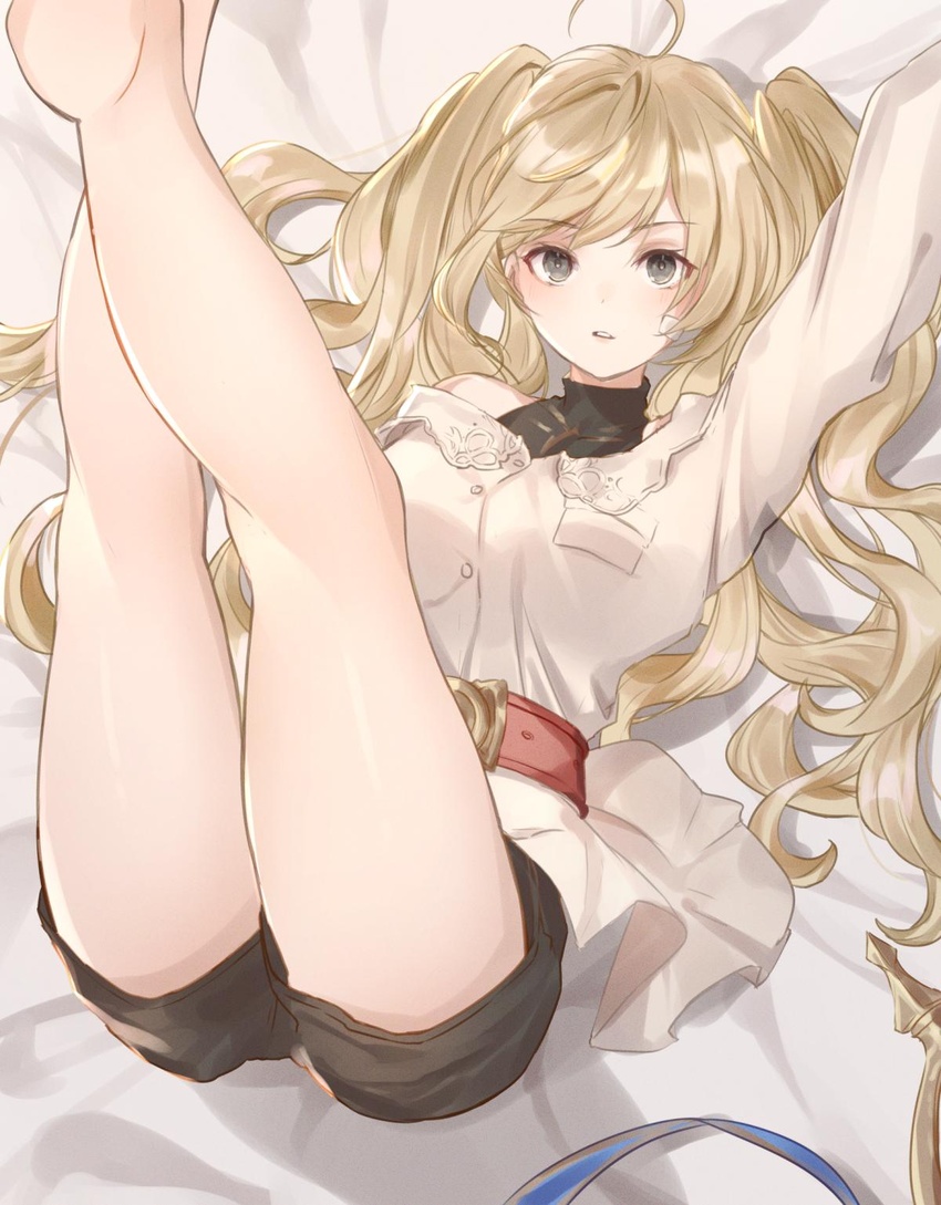 ahoge bad_id bad_twitter_id bed bed_sheet blonde_hair breasts female granblue_fantasy grey_eyes highres large_breasts legs_up looking_at_viewer lying monika_weisswind on_back on_bed rotmico shorts solo